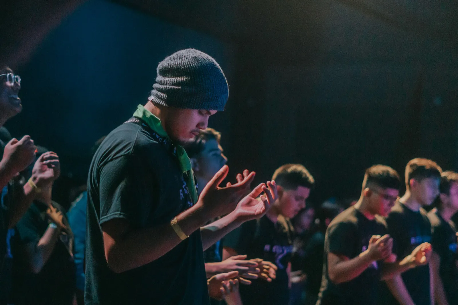 Worship congregation gathered in prayer before service